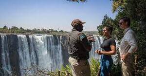 Tourists at a fall in Livingstone, 